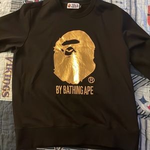 Size large black and gold BAPE sweater. Worn once.